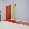 Отель OYO 90604 Menara Sakti Syariah Homestay, фото 3