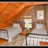Отель Logged Inn - 3 Br cabin by RedAwning, фото 5