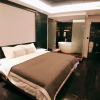 Отель Taiyuan Strawberry Apartment Xuefu Br., фото 12