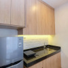 Отель Minimalist and Homey 1BR at Ciputra World 2 Apartment, фото 2