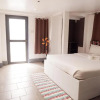Отель Vaccinated Staff - Capital O 492 Sunset View Ridge Residences, фото 4