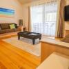 Отель Blackbutt Family Loft Townhouse в Камс-Уорфе