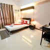 Отель ZEN Rooms Sunshine City Suites, фото 17