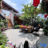 Отель Lijiang Tongxin Garden Inn, фото 4