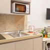 Отель Devon Metro Studio Apartments, фото 13