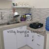 Отель Villa Syariah Bunga Tanjung 16 - Two Bedroom, фото 11