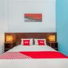Отель OYO 2450 Hening Homestay Near Pantai Tanjung Bias, фото 5