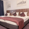 Отель Ramada by Wyndham Frankfurt Central Station, фото 3