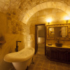 Отель Kayakapi Premium Caves - Cappadocia, фото 8