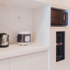 Отель Spacious And Homey 3Br At Sky House Bsd Apartment, фото 5