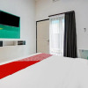Отель OYO 90459 Kepuharjo Guest House, фото 16