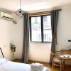 Отель Henry's Apartment - Jiande Road, фото 5