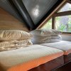 Отель Houten bosvilla met sauna en 2 slaapkamers в Доорне