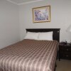 Отель Perfect Inns & Suites, фото 1