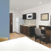 Отель Woodspring Suites Rochester Greece, фото 2