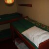 Отель Amahoro Guest House - 6-bed Mixed Dormitory Room, фото 6