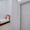 Отель OYO 90387 Sepakat Guest House, фото 7