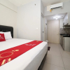 Отель RedLiving Apartemen Springlake Summarecon - Happy Rooms with Netflix, фото 5