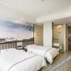 Отель Shaoxing Snail Manju Business Hotel, фото 2