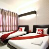 Отель ZEN Rooms Sunshine City Suites, фото 21