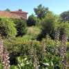 Отель Domaine Charente - B&B / Familyroom Le Jardin (with external toilet & shower house) в Ла Паленн