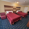 Отель Delmonico Inn & Suites, фото 9