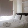 Отель Cozy Stay and Simply 2BR at Green Pramuka City Apartment, фото 3