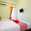 Отель OYO 1419 Rhona Guest House Syariah, фото 4