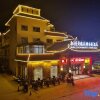 Отель Mijng Qiyuan Minority Theme Hotel, фото 1
