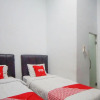 Отель SUPER OYO 91627 Wika Wiki Homestay, фото 18