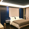 Отель Taiyuan Strawberry Apartment Xuefu Br., фото 6