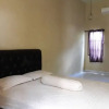 Отель OYO 94222 Anda Kost 2, фото 3