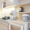 Отель Comfort And Warm 2Br At Parkland Avenue Apartment, фото 15