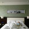 Отель Kunlun Leju Business Hotel, фото 6