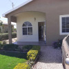 Отель Charming 2-bed House in Portmore Gated Community, фото 8