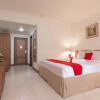 Отель Reddoorz Premium Near Jembatan Ampera 2, фото 7