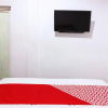 Отель OYO 1118 Artomoro Family Guesthouse, фото 4
