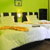 Отель Sukau Greenview Bed & Breakfast, фото 14
