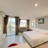Отель OYO 1062 Wannatel Hotel And Apartment, фото 4