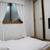 Отель Dong Chun Guest House, фото 2