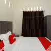 Отель OYO 1694 Pariban Homestay, фото 28