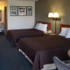 Отель Travelers Inn & Suites, фото 7