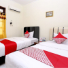 Отель OYO 1366 Kayoman Family Homestay, фото 7