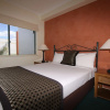Отель Mid City Luxury Suites, фото 4