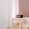 Отель Simply Good Studio Room at Springlake Summarecon Apartment, фото 8
