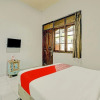 Отель OYO 90155 Landuh Merta Residence, фото 7