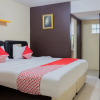 Отель Super OYO Capital O 989 Audah Guesthouse Syariah, фото 4