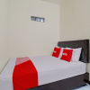Отель OYO Life 92685 Kost Arimbi, фото 1