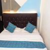 Отель OYO 91026 Kasmarani Residence Syariah, фото 18