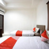 Отель OYO 2886 Her Mandiri Guest House, фото 7